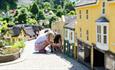 Child viewing the Old Shanklin Village miniature at the Godshill Model Village, Isle of Wight, Things to Do