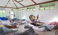 Mel providing a sound bath to attendees at Ventnor Botanic Gardens on the Isle of Wight, wellness, retreat, activity, health and wellbeing, sanctuary