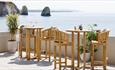 Tables and chairs on terrace with sea views at The Albion Hotel, Freshwater, boutique hotel, luxury, Isle of Wight