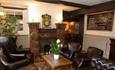 Inside comfy large chairs at The White Lion, Arreton, pub