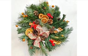 Family showing the crafts they've made at a craft workshop at Island CraftWorks, Ryde, Isle of Wight, family, Christmas Wreath, workshops
