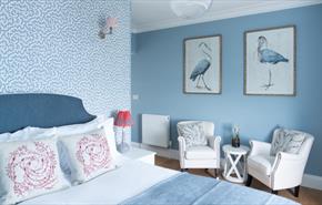 Isle of Wight, Accommodation, The Osborne Guesthouse, Shanklin, Blue Double Room with pictures of Cranes (Birds) on wall above seating area
