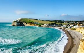 View of Freshwater Bay and Freshwater Bay House in the background, walking holiday, Isle of Wight