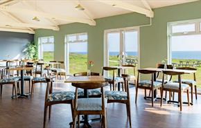 Inside of Isle of Wight Pearl Cafe with sea views, local produce, shopping, things to do, food and drink