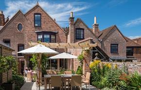 Outside dining area in garden at One Holyrood, B&B, Newport, Isle of Wight