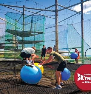 Boy and adult playing on Skynets at Sandham Gardens, Sandown, Things to Do