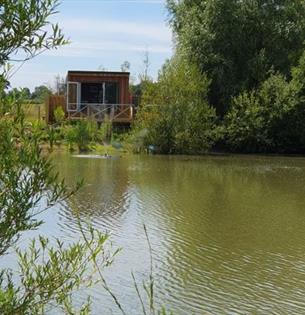 Waterside lodge with lake views at Four Lakes Retreat, self catering, lakeside retreat, Isle of Wight