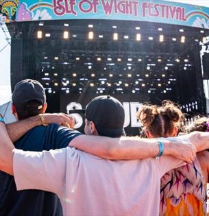 Crowds of people watching an act on the main stage at the Isle of Wight Festival, music, what's on, event