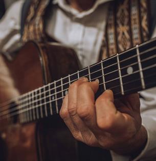 Man playing a guitar, Sunday Jazz event at The Garlic Farm Restaurant, food & drink, what's on, Isle of Wight