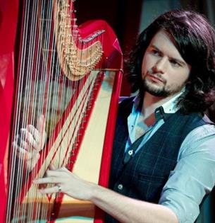 Benjamin Creighton Griffiths playing the harp, live music at Michelangelo Restaurant, Italian food