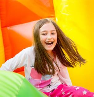 Girl enjoying the bouncy inflatable, Bouncy Barn, Tapnell Farm Park, children's event, what's on