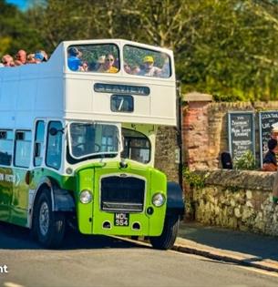 Vintage bus driving along with passengers, Wightrider, Isle of Wight Bus & Coach Museum, Ryde, classic buses, what's on, event - image credit: Rosie T