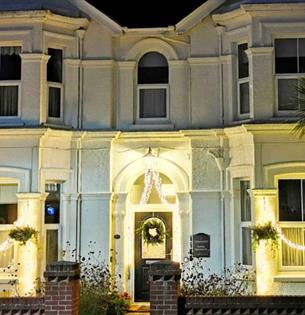 Outside view of Fernhurst Holiday Apartments with Christmas lights, self catering, Shanklin, Isle of Wight