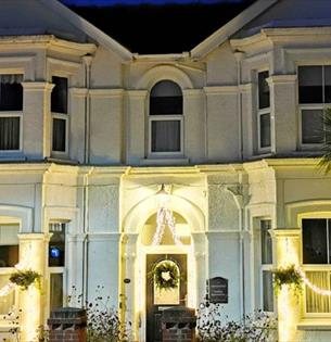 Christmas decorations and lights outside of Fernhurst Holiday Apartments, self catering, Shanklin, Isle of Wight