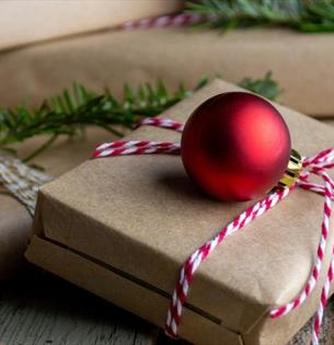 Presents and baubles on a wooden table, Christmas Fair at Northwood House, Isle of Wight, event, what's on, family fun, children activities, dog frien