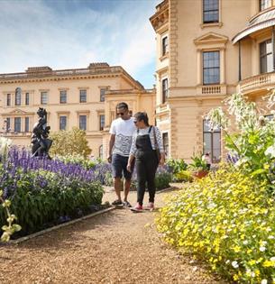 Couple walking around the garden outside Osborne House, garden tour, event, what's on, Isle of Wight