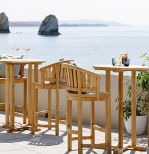 Tables and chairs on terrace with sea views at The Albion Hotel, Freshwater, boutique hotel, luxury, Isle of Wight