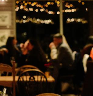 People eating inside The Garlic Restaurant, Isle of Wight, what's on, event, live music, food