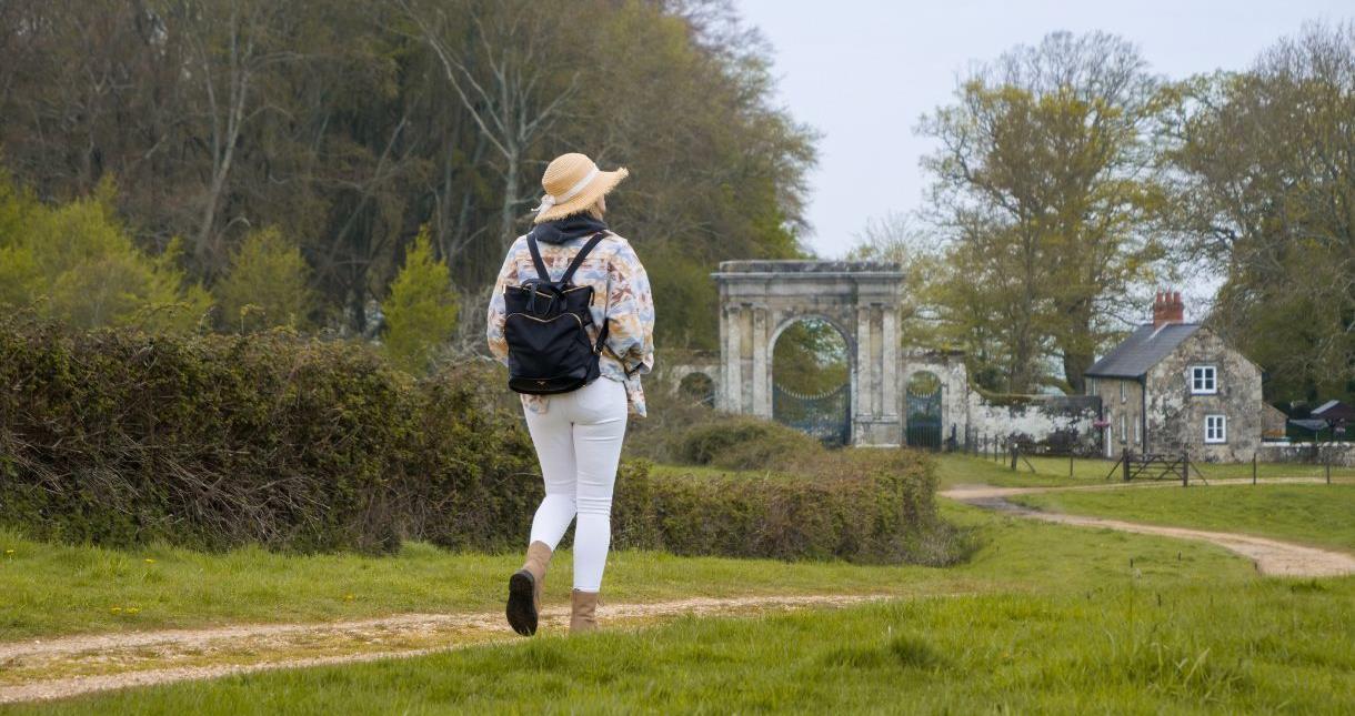 Lady walking to the Freemantle Gate in Wroxall, Isle of Wight