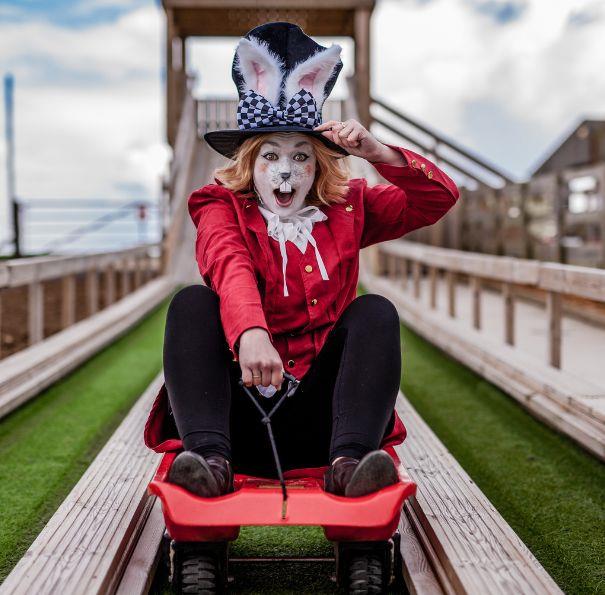 White rabbit on the sledge slide at Alice's Easter Wonderland event at Tapnell Farm Park