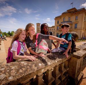 Family outside of Osborne House on the Isle of Wight