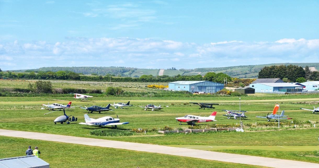 Aerial view of airfield with planes parked at Isle of Wight Airport Sandown
