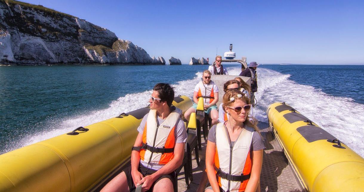 Group of people on a rib around the Needles