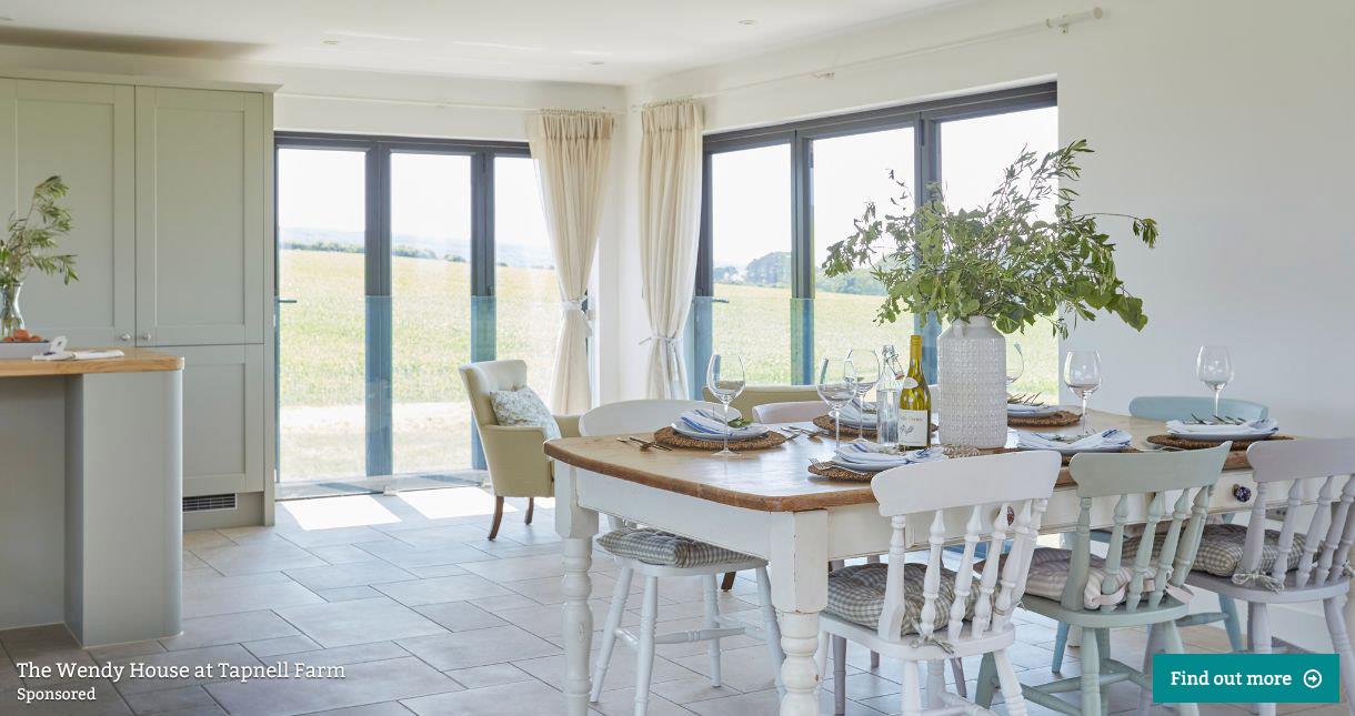 Open plan kitchen and dining area with countryside views at The Wendy House located at Tapnell Farm
