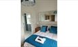 Double bedroom with view of en-suite bathroom at Clarence House in Shanklin, Isle of Wight, B&B