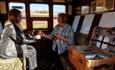 Two ladies enjoying a picnic in the carriage of the steam train, Isle of Wight Steam Railway, Havenstreet, Things to Do