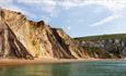 View from the sea of beach and cliffs at Alum Bay beach, Isle of Wight, Things to Do