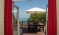 Outdoor seating area on balcony with sea view at Ocean Deck Apartment, self catering, Shanklin, Isle of Wight