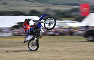 Motorbike stunt at The Chale Show, what's on, Isle of Wight