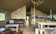 Open plan kitchen, dining and living area in safari tent, Glamping the Wight Way, self catering, Isle of Wight