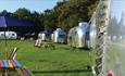 Picnic tables outside of American airstreams at Retro Staycations, glamping, Isle of Wight