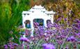 Flowers and archway at Robin Hill - Things to Do, Isle of Wight.