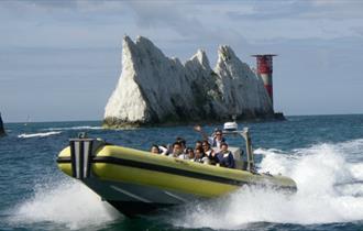 Group of people on a RIB around the Needles, Needles Pleasure Cruises, Isle of Wight, Things to do
