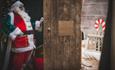 Father Christmas opening a door, Christmas at Tapnell Farm Park, What's On