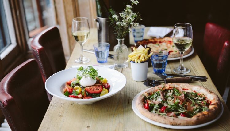 Pizza, salad, fries and wine at The Coast Bar & Dining Room, Cowes, Eat & Drink - Copyright: Maria Bell