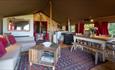Living area in Safari Tent at Tom's Eco Lodge, self-catering, West Wight, Isle of Wight