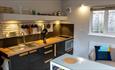 Kitchen and living area at Totland Bay Cabin, self-catering, Isle of Wight