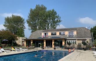 Outside view of The Core Complex overlooking the swimming pool at Appuldurcombe Gardens Holiday Park, Isle of Wight