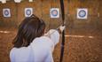 Lady enjoying archery at Tapnell Farm, Isle of Wight, activities