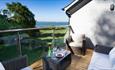 Balcony with sea view at Woodland Cottage, Fort Victoria Cottages, Yarmouth, Isle of Wight, Self catering