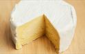 Image of a round of isle of wight soft cheese with a slice missing, Isle of Wight Cheese CO, Local produce, Sandown