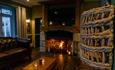 Open fire lit in lounge area at The Wellington Hotel, Ventnor, Isle of Wight