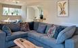 Dining and lounge area in apartment at Appuldurcombe Gardens Holiday Park, Isle of Wight, Self catering