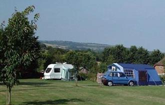 Touring caravans pitched at Old Barn Touring Park, Sandown, Isle of Wight
