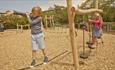 Children on the outside playground at The Lakes Rookley, Isle of Wight, Self Catering