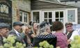 People enjoying a drink outside The Buddle Smuggler's Inn, Niton, local produce, let's buy local